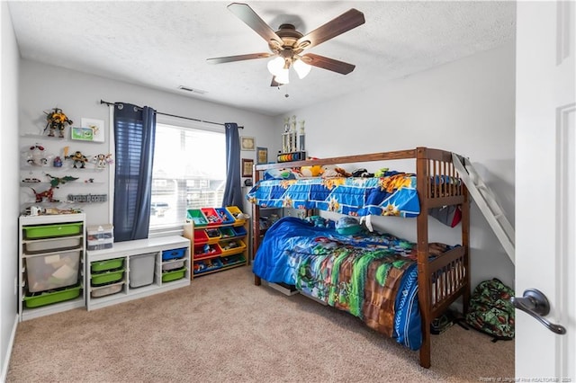 4112 Newgate St, Fayetteville, NC 28306 - bedroom with carpet flooring, a textured ceiling, and a ceiling fan