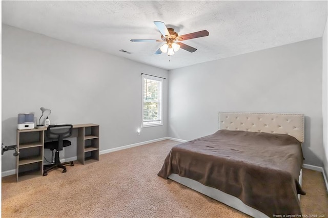 4112 Newgate St, Fayetteville, NC 28306 - bedroom with carpet flooring, an office area, a ceiling fan, and a textured ceiling