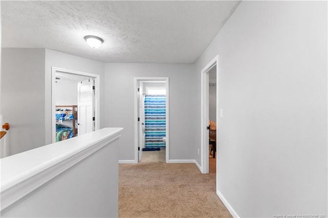 4112 Newgate St, Fayetteville, NC 28306 - corridor featuring light colored carpet and a textured ceiling