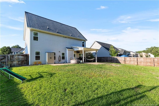 4112 Newgate St, Fayetteville, NC 28306 - back of property featuring a patio and a fenced backyard
