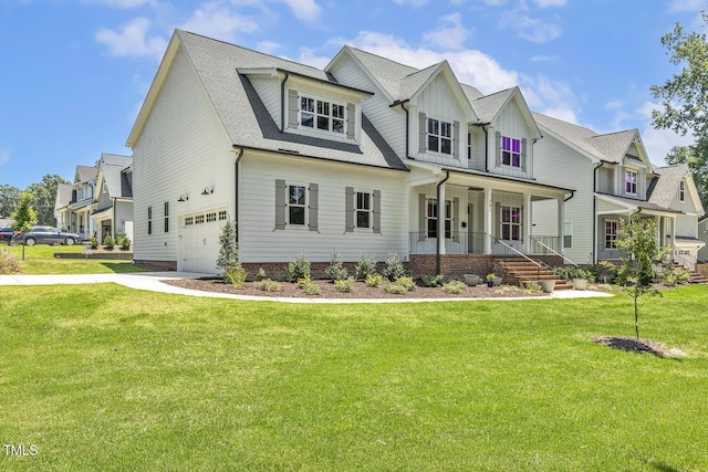201 S Ennis St, Fuquay Varina, NC 27526 - view of front of house featuring a garage, a porch, a front yard, a residential view, and board and batten siding