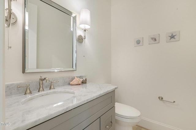 201 S Ennis St, Fuquay Varina, NC 27526 - half bath featuring vanity and toilet