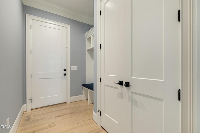 201 S Ennis St, Fuquay Varina, NC 27526 - corridor featuring ornamental molding and light wood-style flooring