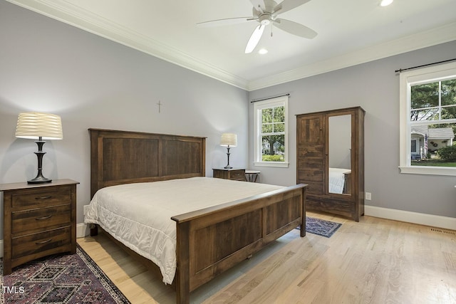 201 S Ennis St, Fuquay Varina, NC 27526 - bedroom with light wood-style floors, recessed lighting, crown molding, and a ceiling fan