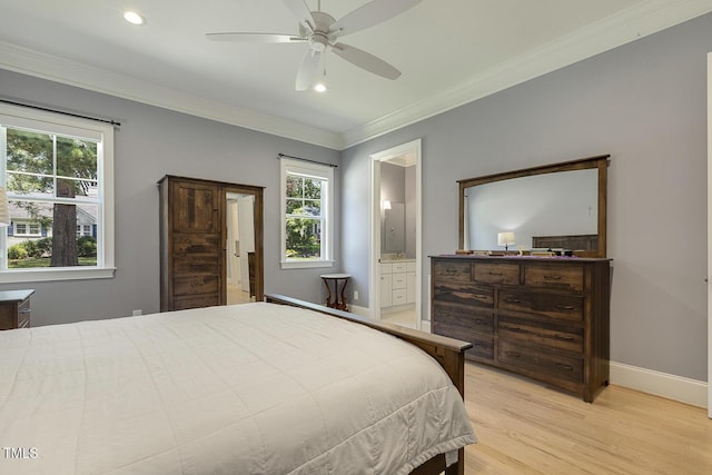 201 S Ennis St, Fuquay Varina, NC 27526 - bedroom with multiple windows, light wood-style flooring, crown molding, connected bathroom, and recessed lighting