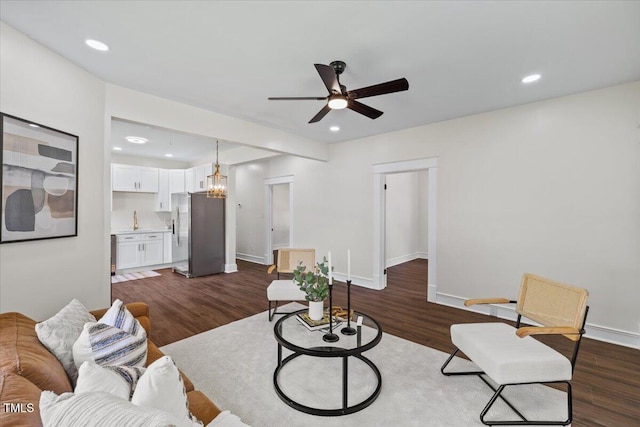 813 N Main St, Burlington, NC 27217 - living room featuring a ceiling fan, dark wood-style flooring, a chandelier, and recessed lighting