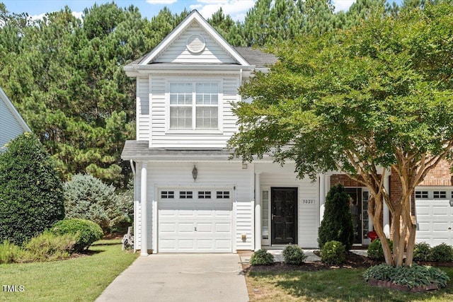 3021 Winding Waters Way, Raleigh, NC 27614 - traditional-style house featuring a garage and driveway