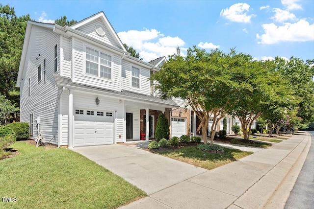 3021 Winding Waters Way, Raleigh, NC 27614 - view of front of home with an attached garage, driveway, and a front lawn