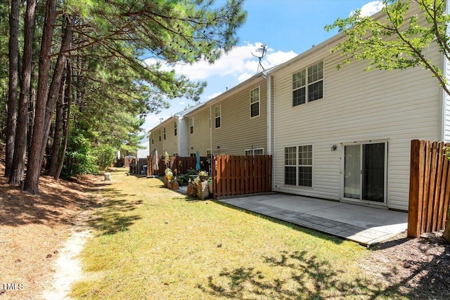 3021 Winding Waters Way, Raleigh, NC 27614 - rear view of house featuring a patio