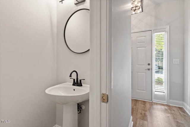 3021 Winding Waters Way, Raleigh, NC 27614 - bathroom featuring wood finished floors and baseboards
