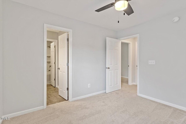 3021 Winding Waters Way, Raleigh, NC 27614 - unfurnished bedroom with carpet floors, connected bathroom, and ceiling fan