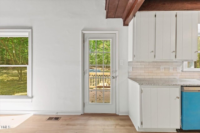 3218 Seven Springs Rd, Hillsborough, NC 27278 - entryway featuring light wood-style flooring and beamed ceiling