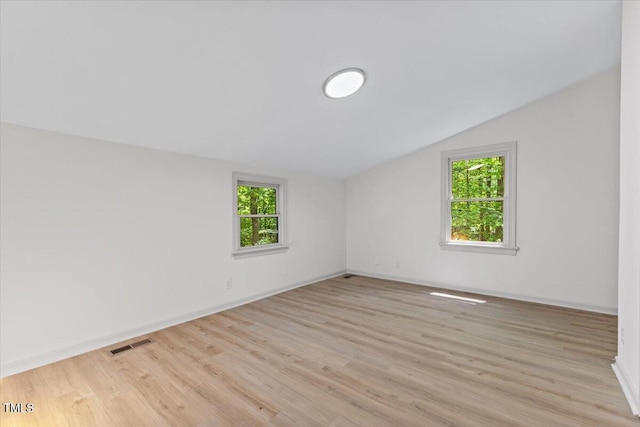 3218 Seven Springs Rd, Hillsborough, NC 27278 - empty room with lofted ceiling and light wood finished floors