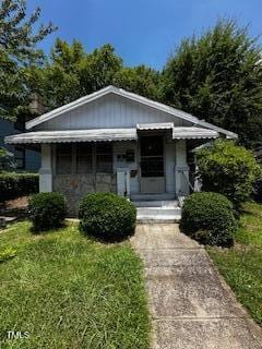 1305 E Jones St, Raleigh, NC 27610 - bungalow-style house with a front lawn