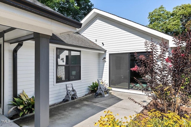 1103 S Bloodworth St, Raleigh, NC 27601 - property entrance with a patio and a shingled roof