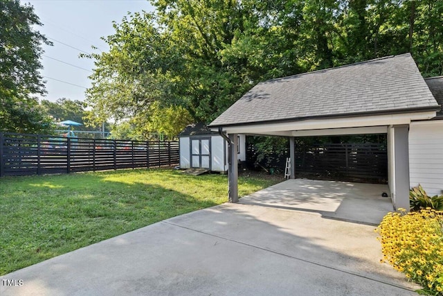 1103 S Bloodworth St, Raleigh, NC 27601 - view of yard with a shed and concrete driveway