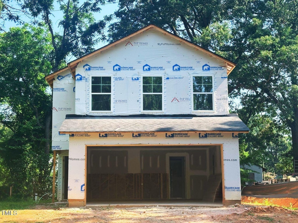 608 Vance St, Mebane, NC 27302 - property under construction with an attached garage and a shingled roof