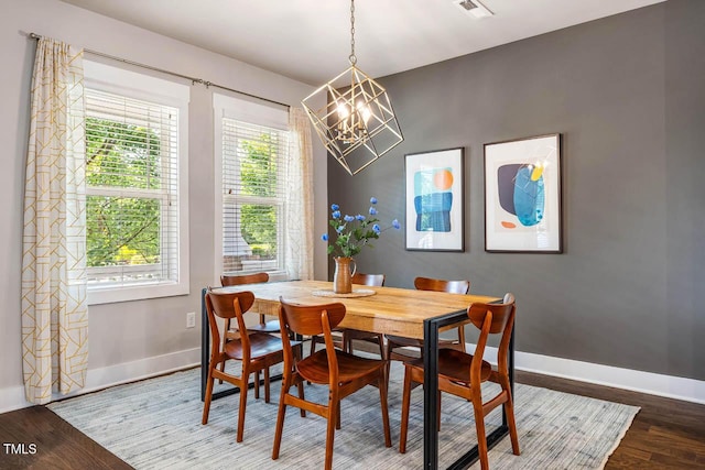 644 Granite Mill Blvd, Chapel Hill, NC 27516 - dining space with a chandelier and wood finished floors