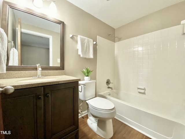 4324 Halliwell Dr, Raleigh, NC 27606 - full bath featuring wood finished floors, shower / bathtub combination, and vanity