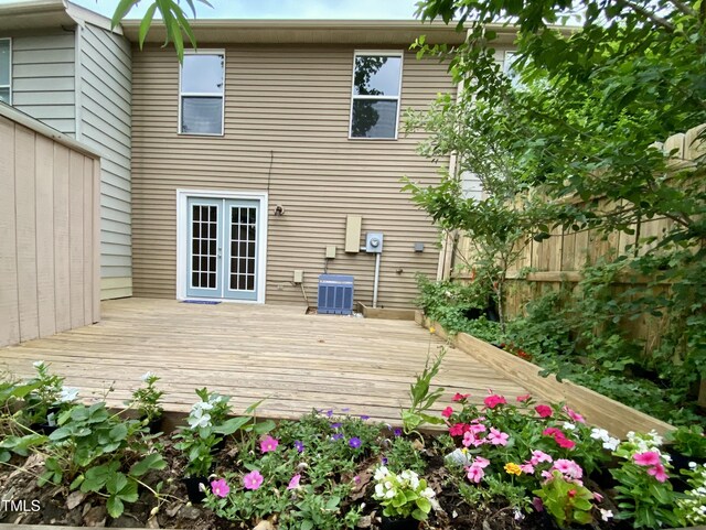 4324 Halliwell Dr, Raleigh, NC 27606 - rear view of house with a wooden deck and french doors