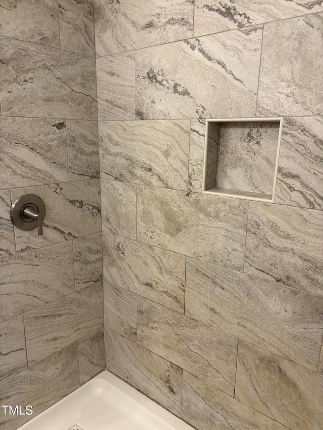 501 Morgan Ter, Burlington, NC 27217 - bathroom featuring a tile shower