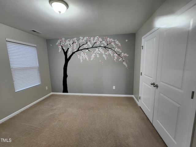 302 Glenview Ln, Durham, NC 27703 - carpeted spare room with baseboards
