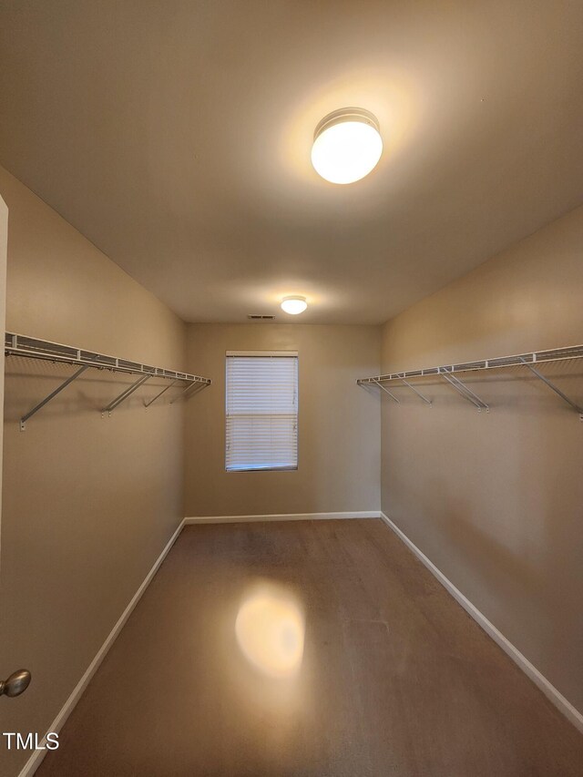 302 Glenview Ln, Durham, NC 27703 - spacious closet featuring carpet floors