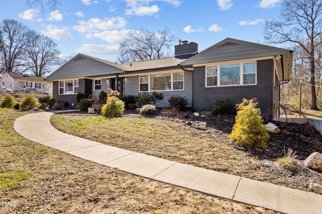 1603 N Alston Ave, Durham, NC 27701 - single story home featuring a chimney and brick siding