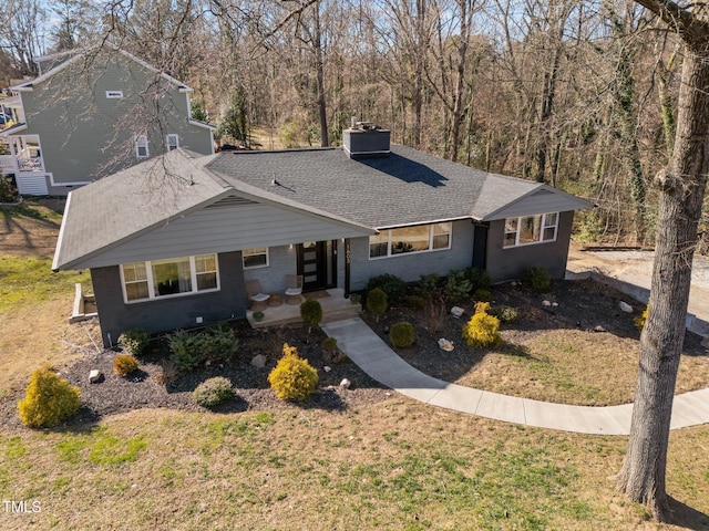 1603 N Alston Ave, Durham, NC 27701 - view of front of property with a chimney, a front lawn, a shingled roof, and brick siding
