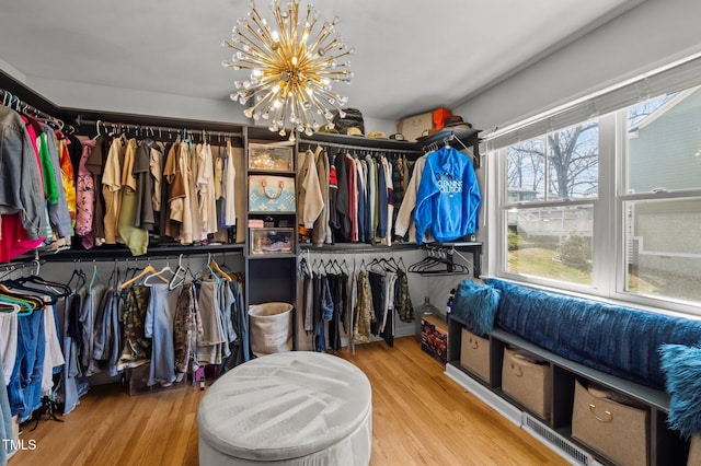 1603 N Alston Ave, Durham, NC 27701 - spacious closet with a chandelier and wood finished floors