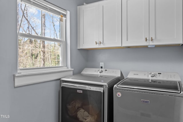 1603 N Alston Ave, Durham, NC 27701 - laundry area featuring cabinet space and independent washer and dryer