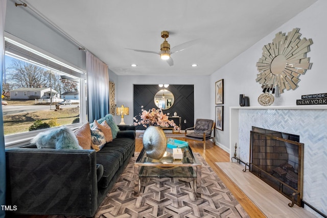 1603 N Alston Ave, Durham, NC 27701 - living room featuring light wood-type flooring, a tile fireplace, recessed lighting, and ceiling fan