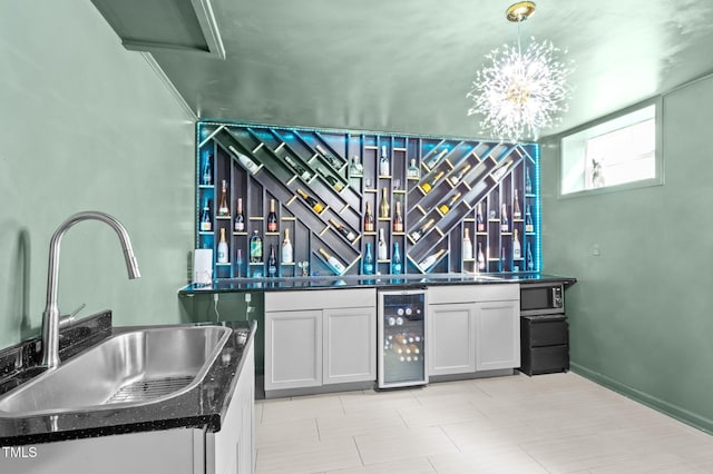 1603 N Alston Ave, Durham, NC 27701 - indoor bar with beverage cooler, a chandelier, and pendant lighting