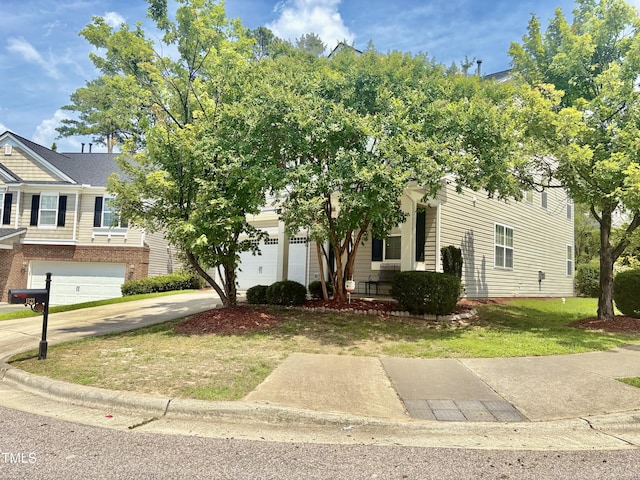 1121 Brookhill Way, Cary, NC 27519 - view of front of home featuring driveway, a front yard, a garage, and brick siding