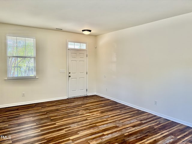 1121 Brookhill Way, Cary, NC 27519 - entryway with baseboards and dark wood-style flooring