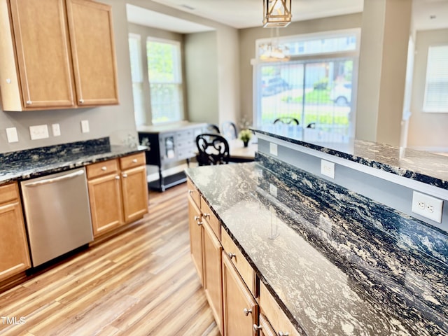 1121 Brookhill Way, Cary, NC 27519 - kitchen featuring stainless steel dishwasher, light wood-style floors, dark stone counters, hanging light fixtures, and light brown cabinetry