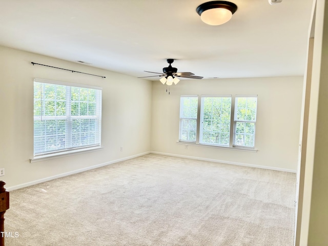 1121 Brookhill Way, Cary, NC 27519 - unfurnished room with healthy amount of natural light, carpet flooring, and a ceiling fan