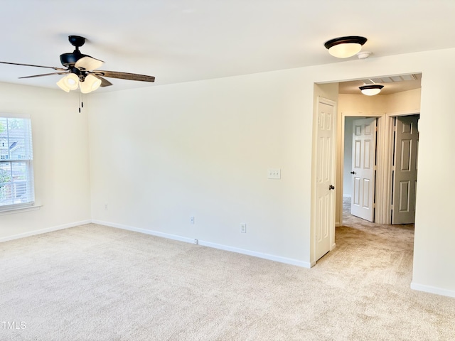 1121 Brookhill Way, Cary, NC 27519 - spare room featuring light carpet and a ceiling fan