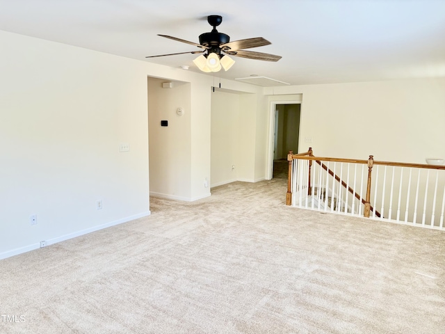 1121 Brookhill Way, Cary, NC 27519 - empty room with attic access, a ceiling fan, and carpet floors