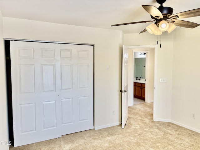 1121 Brookhill Way, Cary, NC 27519 - unfurnished bedroom with light carpet, a closet, and a ceiling fan