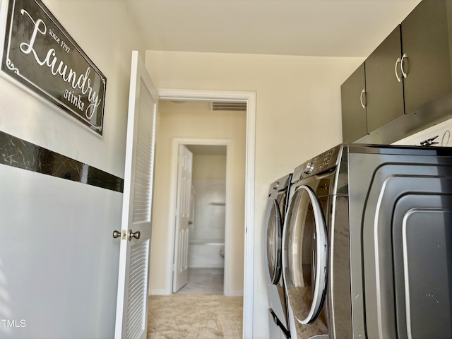 1121 Brookhill Way, Cary, NC 27519 - laundry room with independent washer and dryer, cabinet space, and carpet flooring