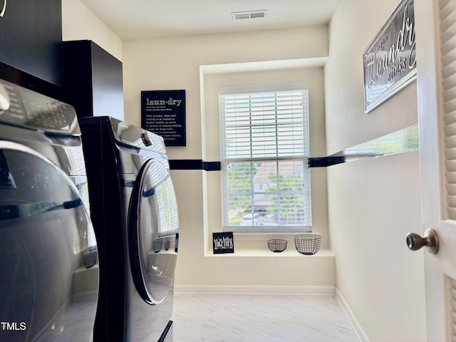 1121 Brookhill Way, Cary, NC 27519 - laundry room featuring independent washer and dryer and marble look tile flooring
