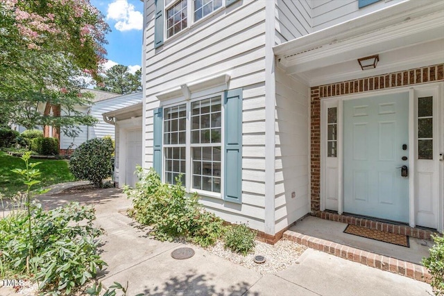 404 Ascott Way, Durham, NC 27713 - property entrance featuring a garage