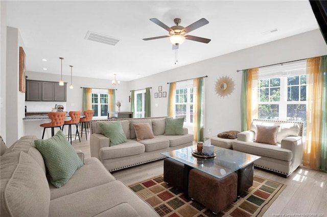 208 Walker Downs Cir, Fayetteville, NC 28305 - living area featuring healthy amount of natural light, light wood finished floors, ceiling fan, and recessed lighting