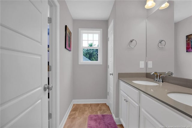 208 Walker Downs Cir, Fayetteville, NC 28305 - full bathroom featuring double vanity and baseboards