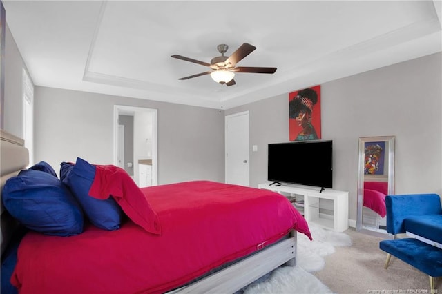 208 Walker Downs Cir, Fayetteville, NC 28305 - carpeted bedroom featuring a raised ceiling, ceiling fan, and ensuite bath
