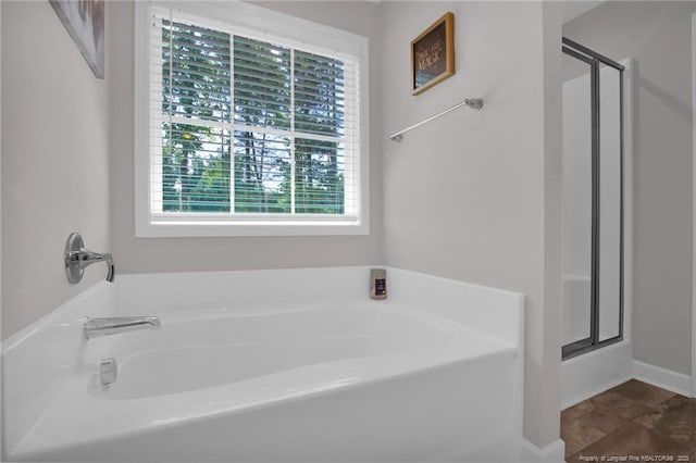 208 Walker Downs Cir, Fayetteville, NC 28305 - full bathroom featuring a stall shower and a bath