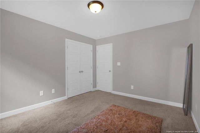 208 Walker Downs Cir, Fayetteville, NC 28305 - unfurnished bedroom with carpet flooring and a closet