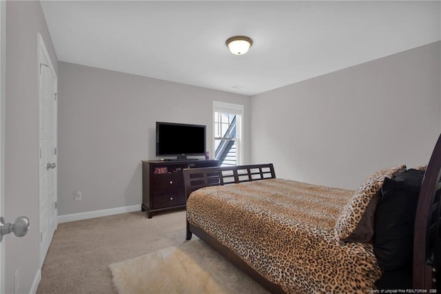 208 Walker Downs Cir, Fayetteville, NC 28305 - bedroom featuring light colored carpet and baseboards