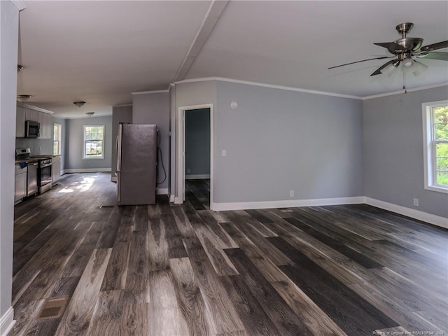 40 Ella Bell Rd, Clarkton, NC 28433 - unfurnished living room featuring ceiling fan, crown molding, healthy amount of natural light, and dark wood-type flooring